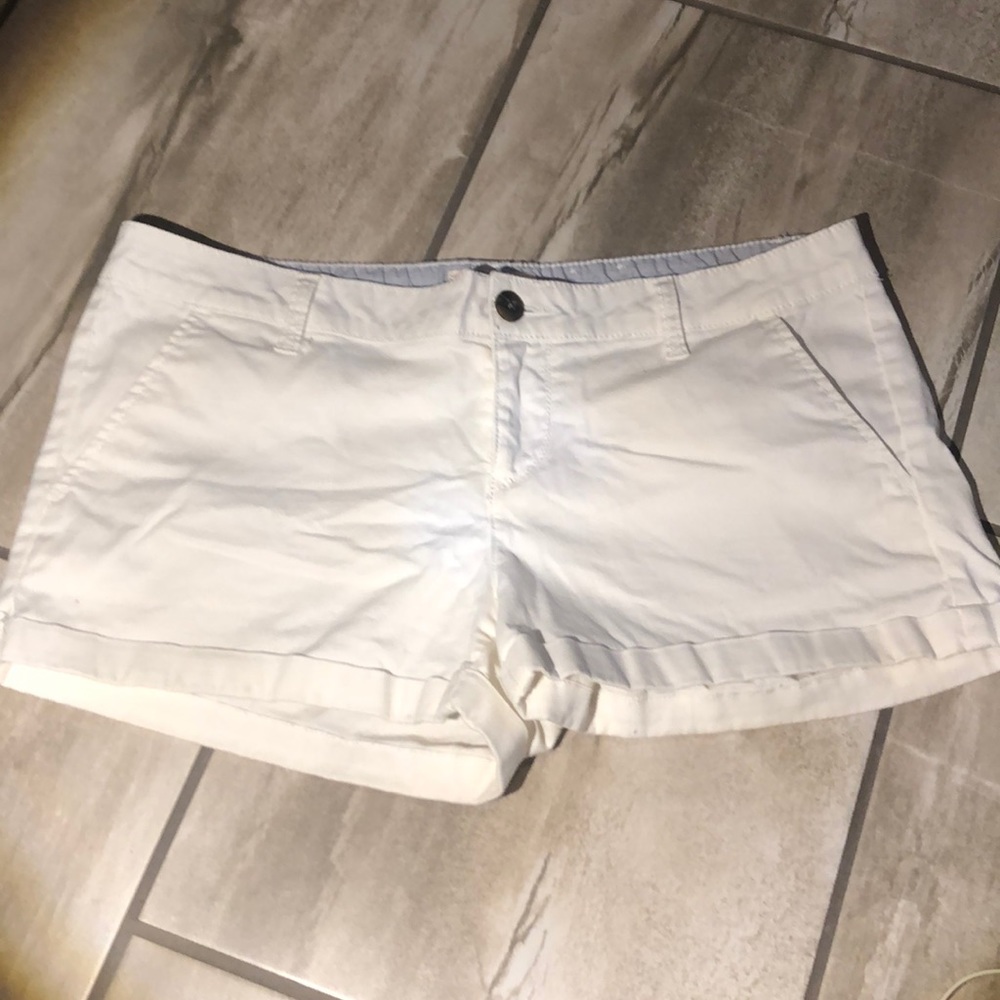 White daisy duke style shorts